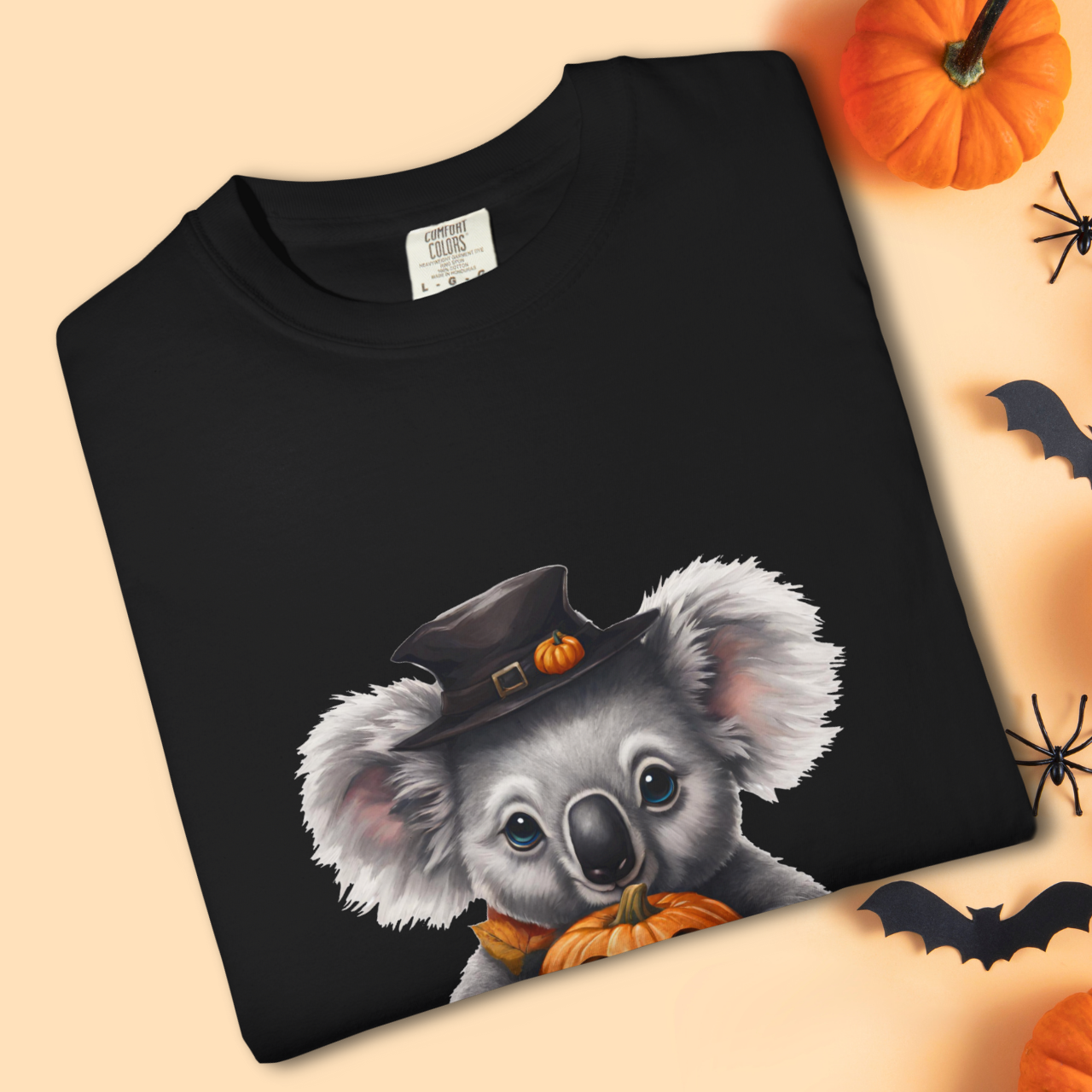 Close-up of spooky cute koala illustration on Halloween-themed unisex t-shirt