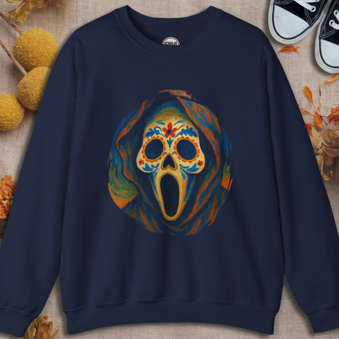 Navy sweatshirt with a colorful ghost face sugar skull design on a textured surface.