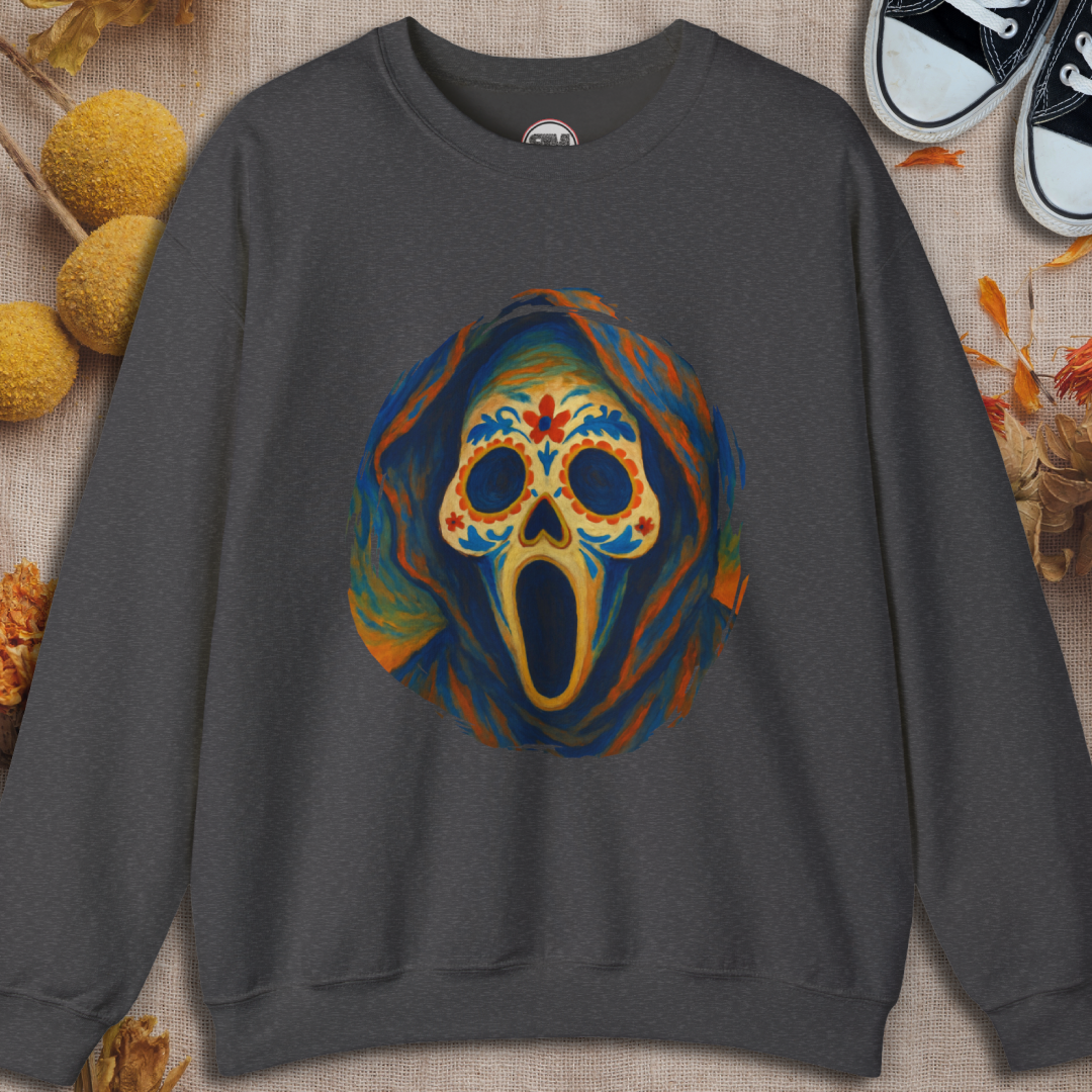 Gray sweatshirt with a colorful ghost face sugar skull design on a textured surface.