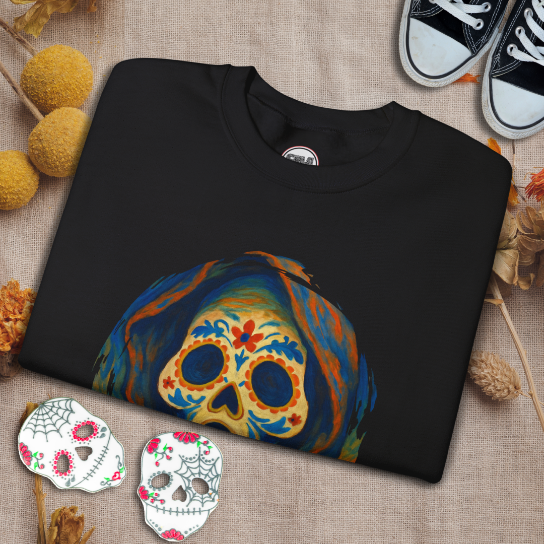 Black sweatshirt with a colorful skull design on a textured surface with decorative elements.