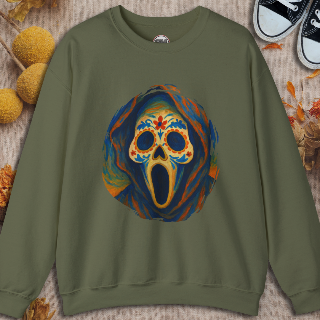 military green sweatshirt with a colorful skull design on a textured surface.