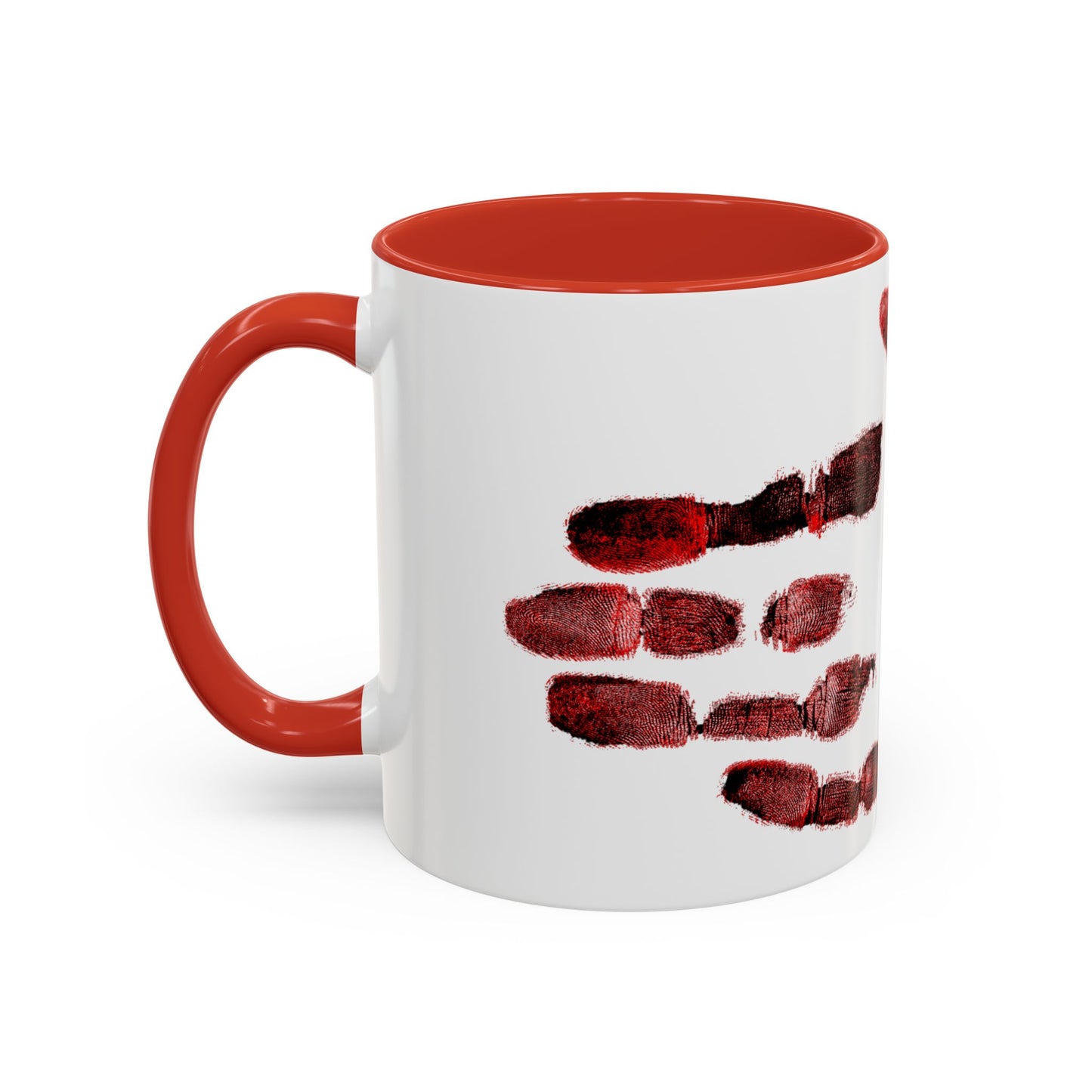 A white ceramic mug with a striking bloody handprint to look as though the hand that cupped it was bloody.