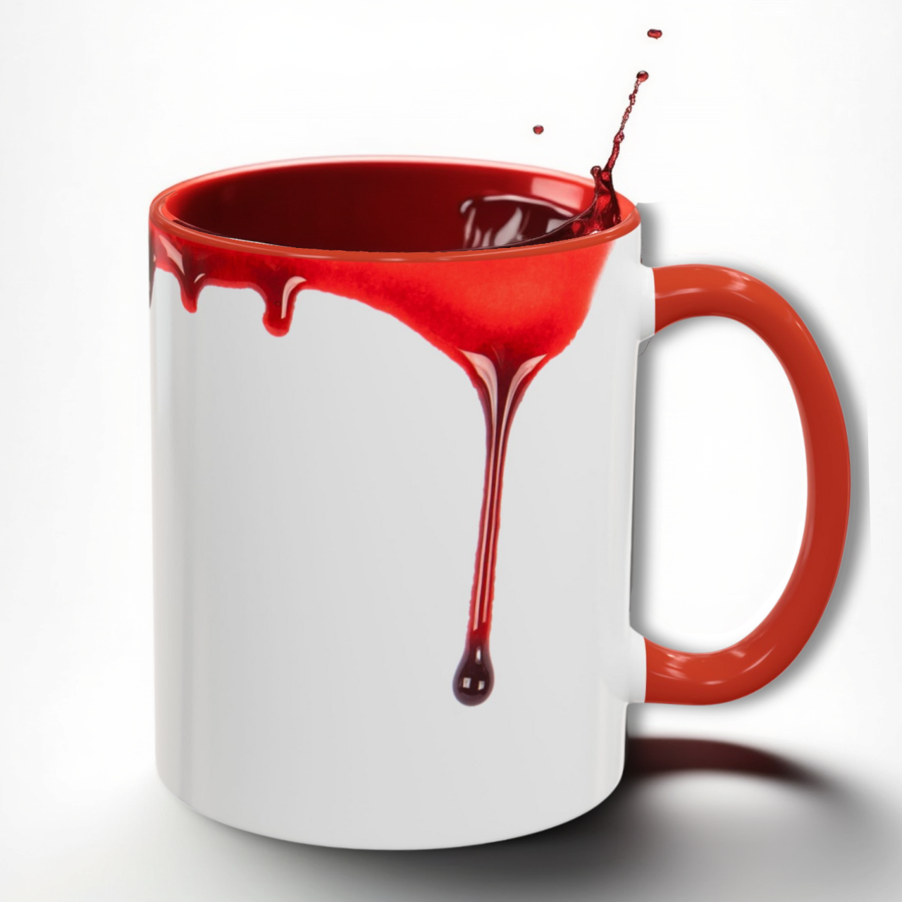 White mug with red interior and handle, featuring red blood dripping and a red liquid splashing out of the mug.