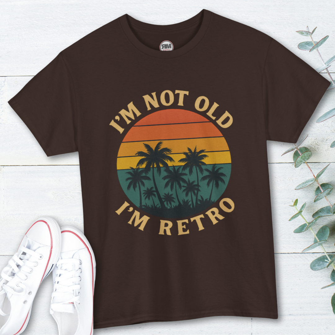 I'm not old I'm retro text curved around a retro sunset with black palm trees