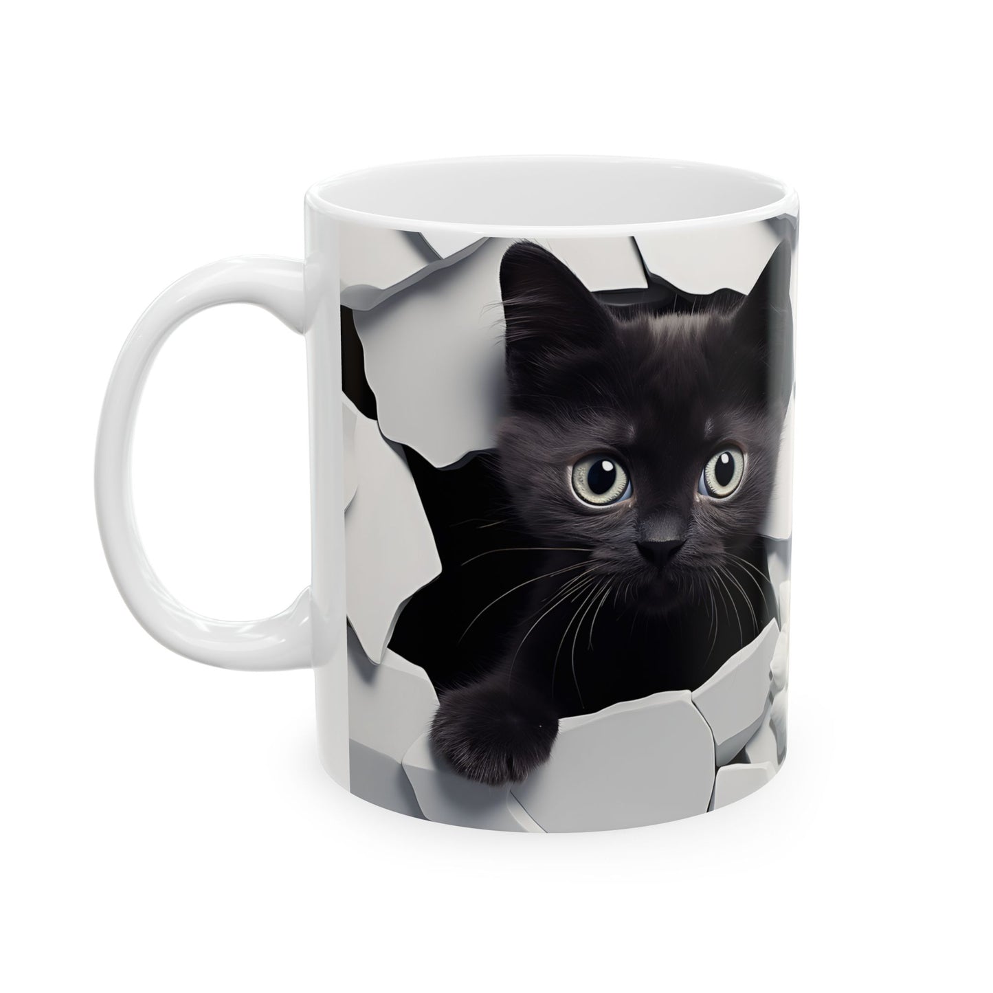 White mug with a black kitten peeking out of a cracked eggshell design on a white background