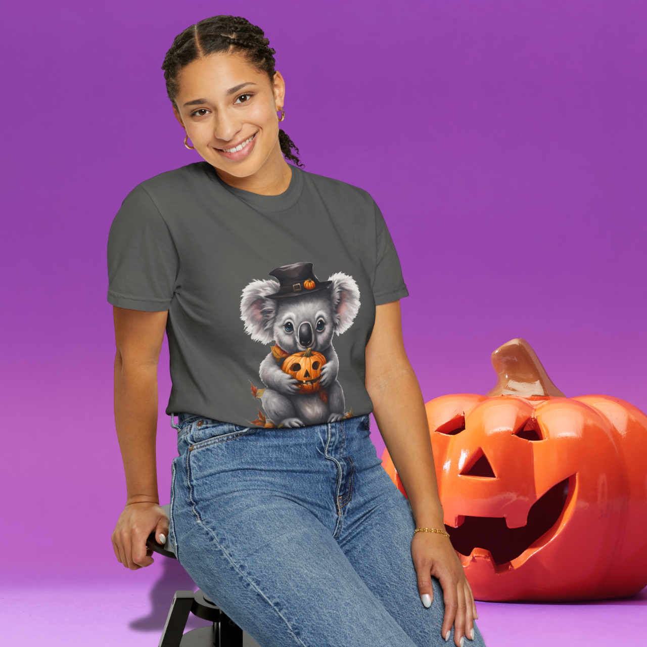 Person wearing Halloween Koala tee in fall setting – cozy spooky outfit idea