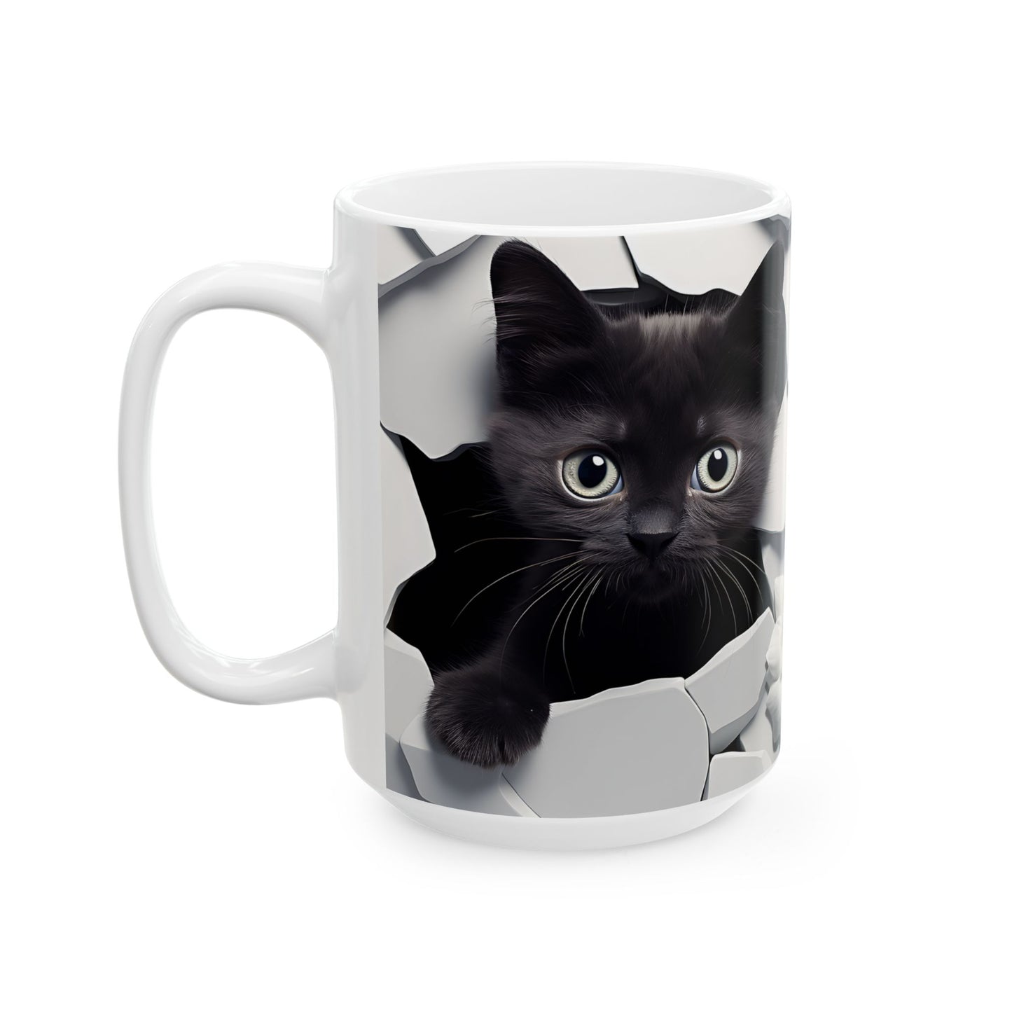 White mug with a black kitten peeking out of a torn paper design on a white background