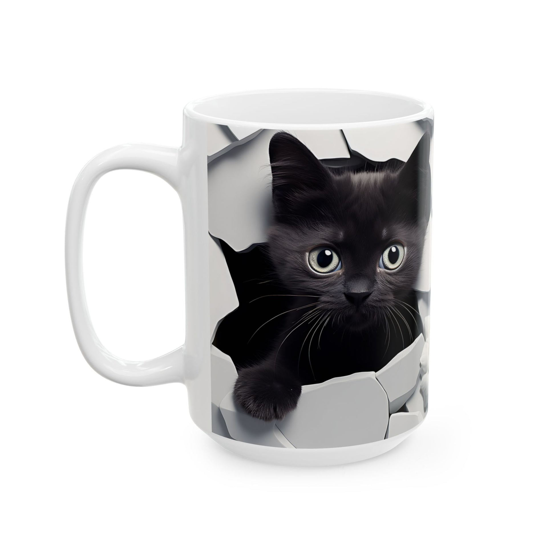 White mug with a black kitten peeking out of a torn paper design on a white background