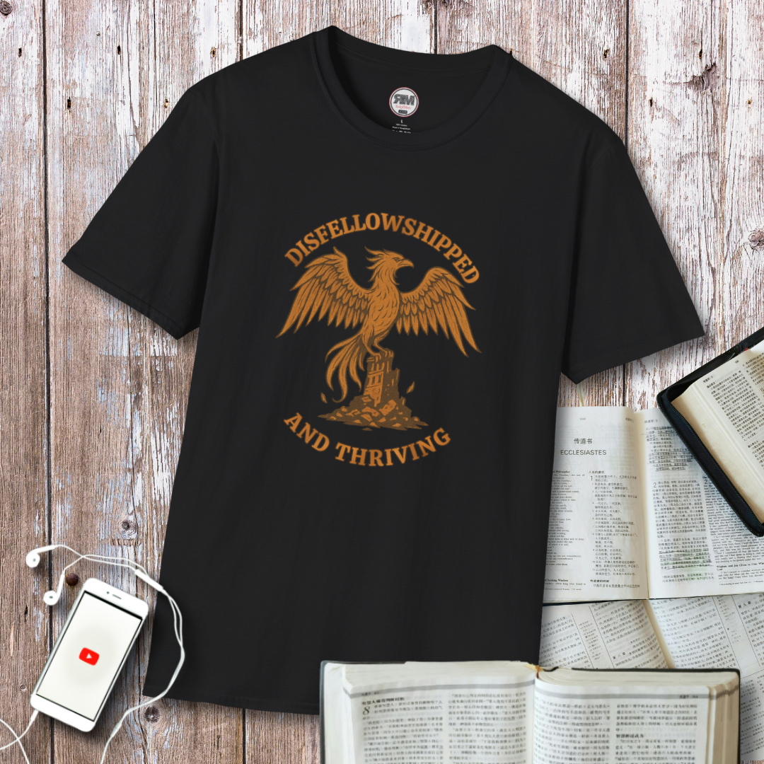 Black unisex t-shirt with orange phoenix graphic and the words ‘Disfellowshipped and Thriving’ – exJW cult recovery design.