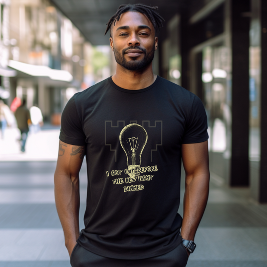 Black unisex t-shirt with white text reading ‘I Got Out Before the Light Dimmed’ – ExJW cult recovery design.